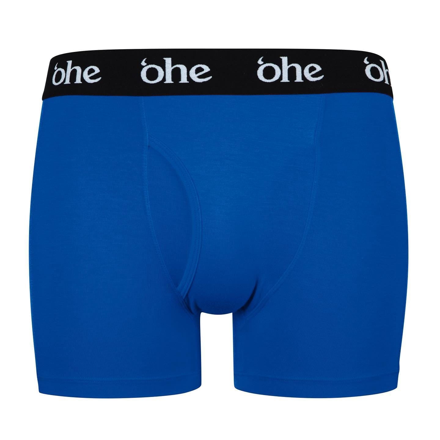 Front view of blue men's bamboo underwear boxer shorts with black waist band and white 'ohe logo