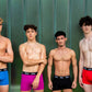 4 sporty young men of various sizes, wearing blue, purple, black and red boxer shorts from the 'ohe bamboo underwear range