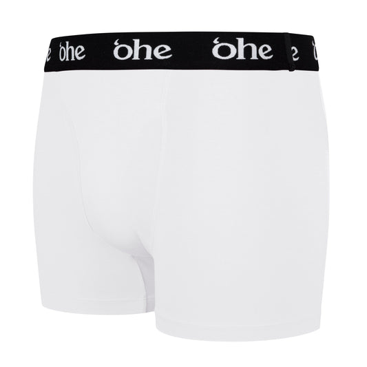 Diagonal view of white men's bamboo underwear boxer shorts with black waist band and white 'ohe logo