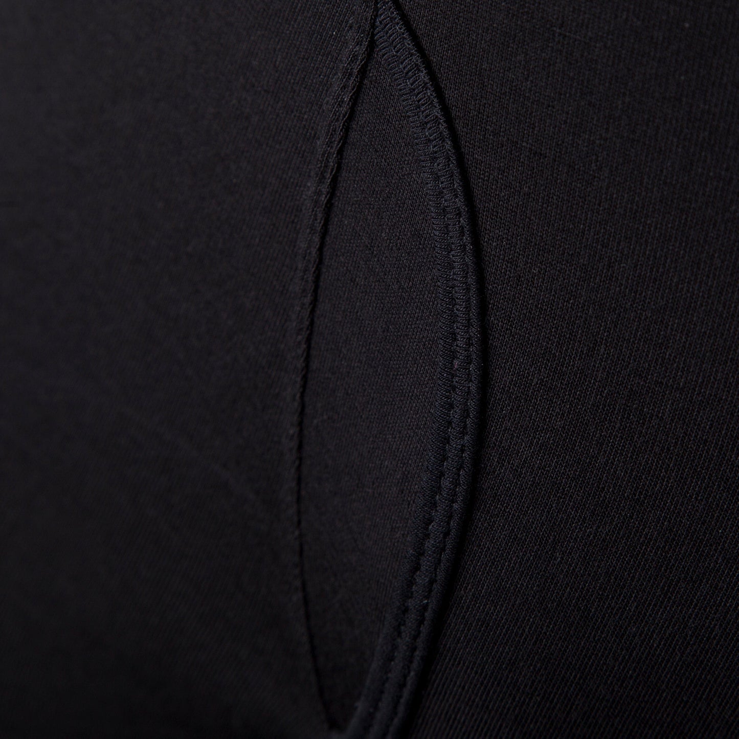 Close up view of fly on black men's bamboo boxer shorts from 'ohe